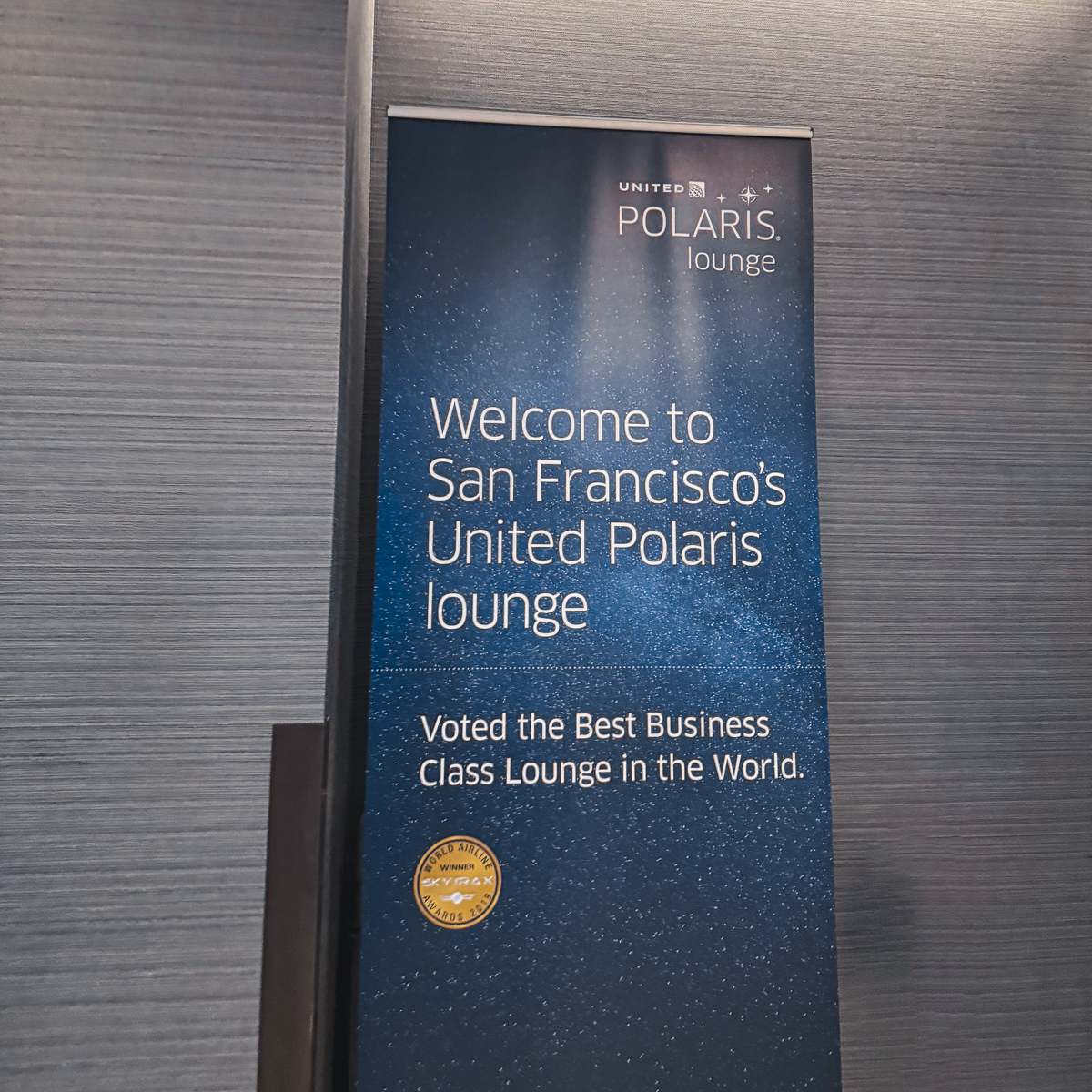 Banner welcoming you to SFO United Polaris lounge.