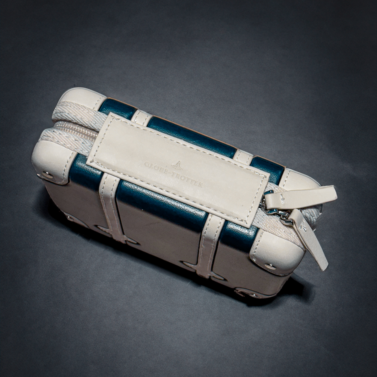 Blue Globe Trotter hard-shell amenity kit.