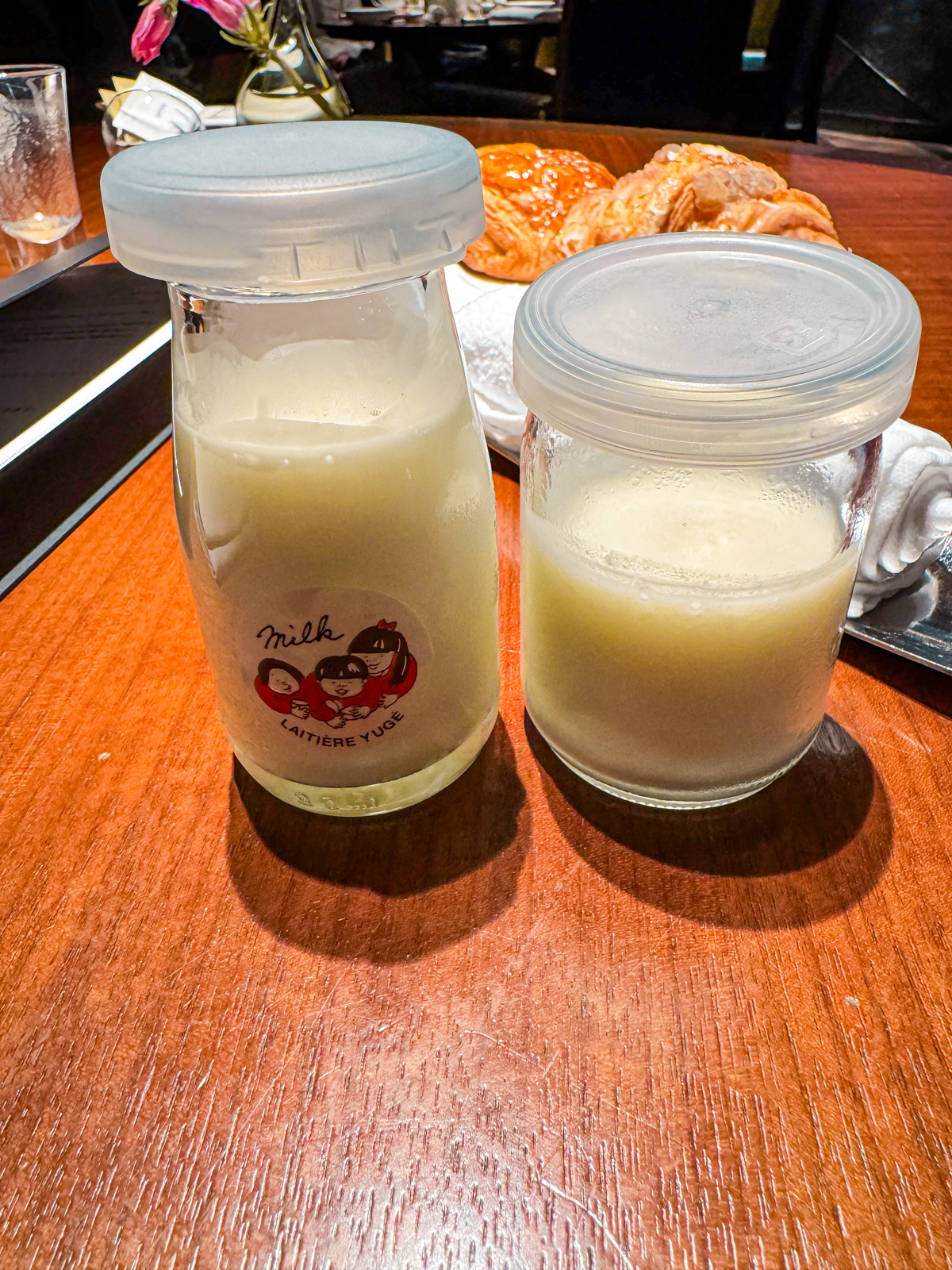 2 glass jars of milk from Yuge farm.