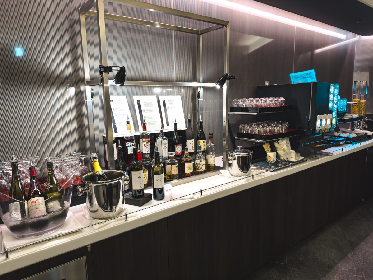 Alcohol and drinks bar inside ANA suite lounge.